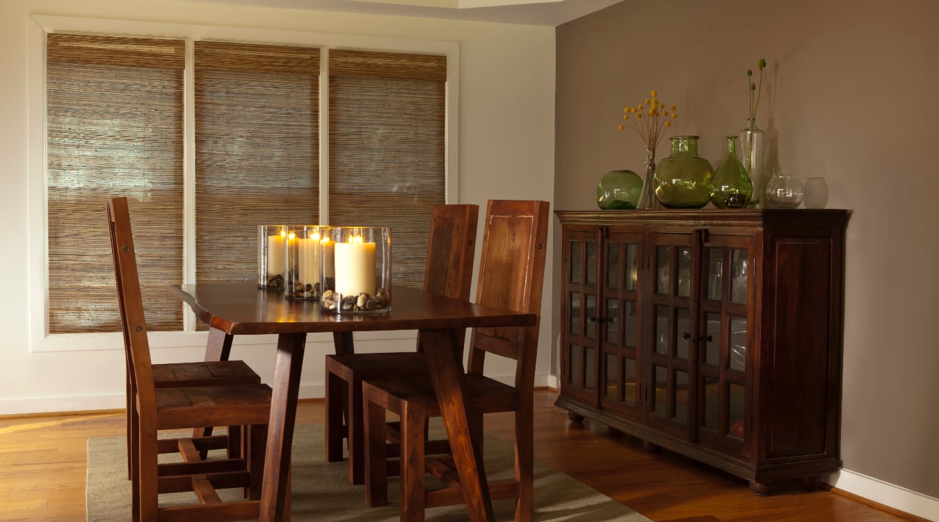 Woven shutters in a Houston dining room.